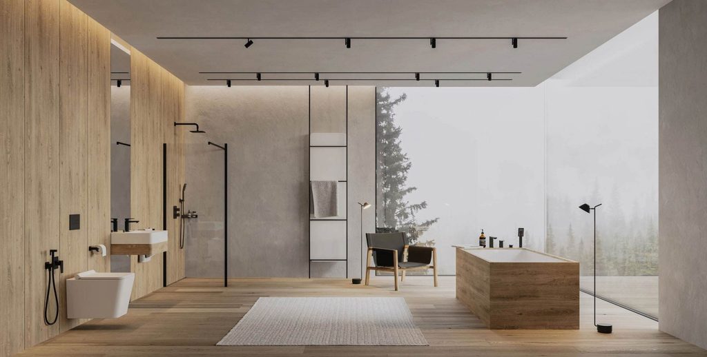 Salle de bain contemporaine en bois clair et béton avec baignoire et baie vitrée donnant sur une forêt