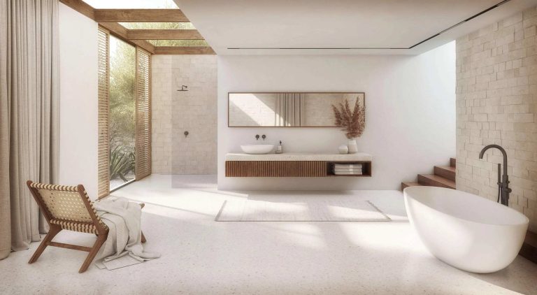 Salle de bain méditerranéenne lumineuse en zellige beige avec baignoire îlot et puits de lumière